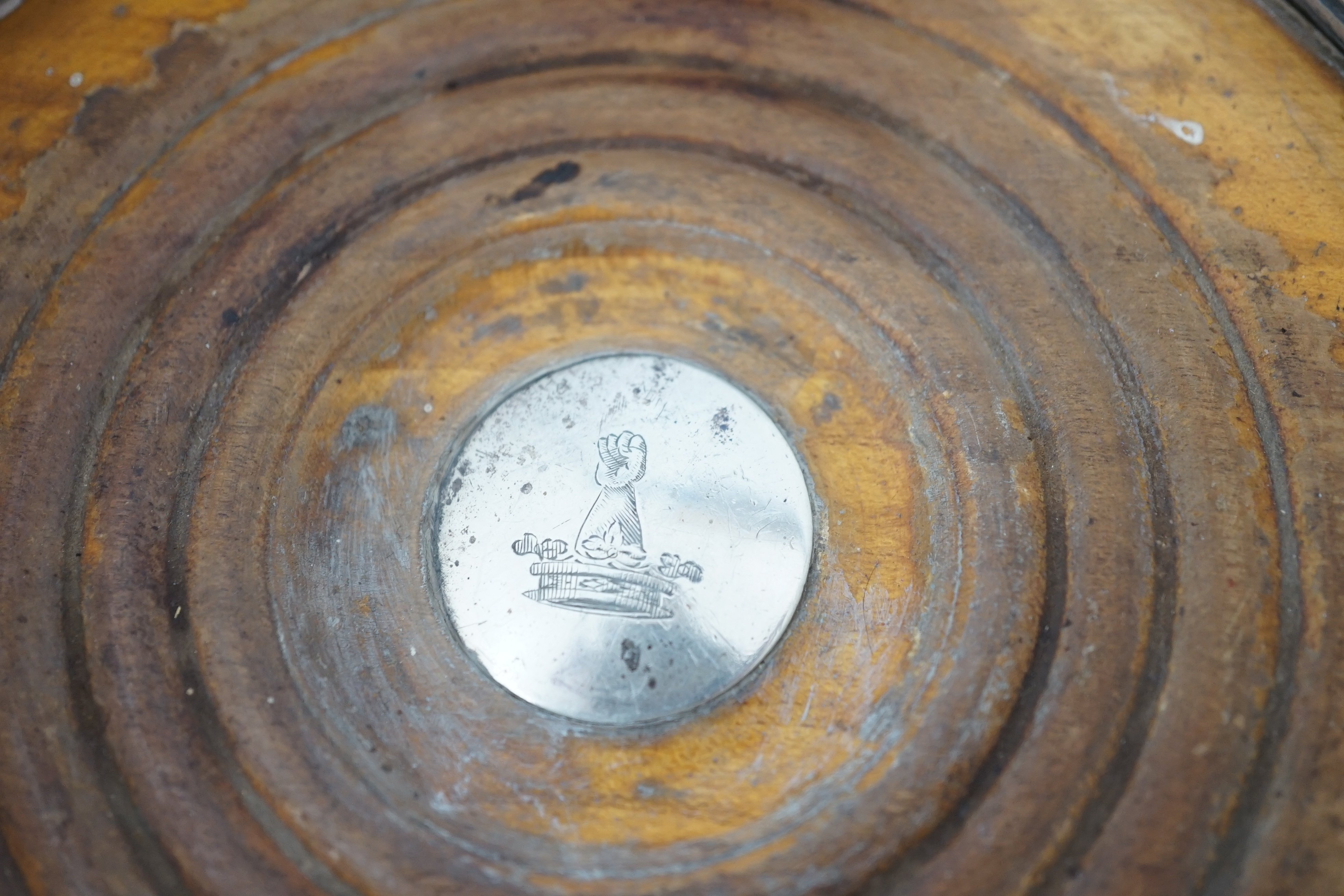 Two pairs of early 19th century silver mounted wine coasters